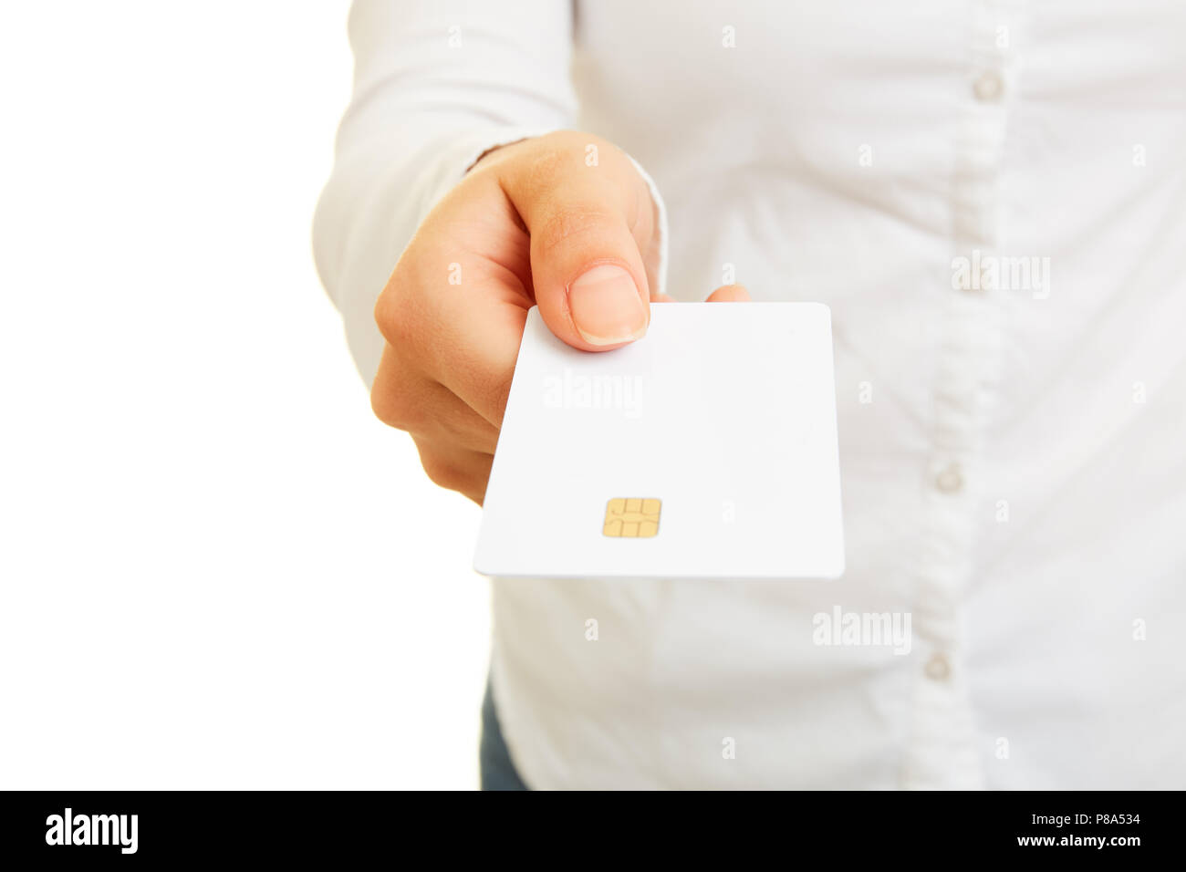 Female hand is holding a blank smart card or smartcard with contact chip Stock Photo