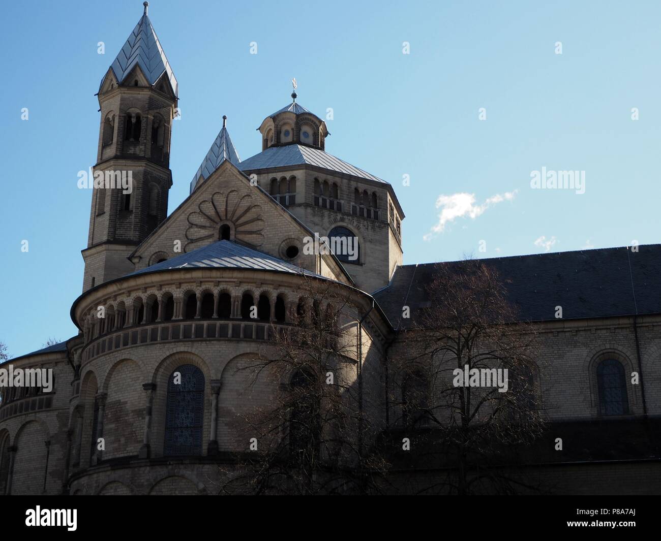 St. Aposteln church in Cologne with the blue sky in the background Stock Photo