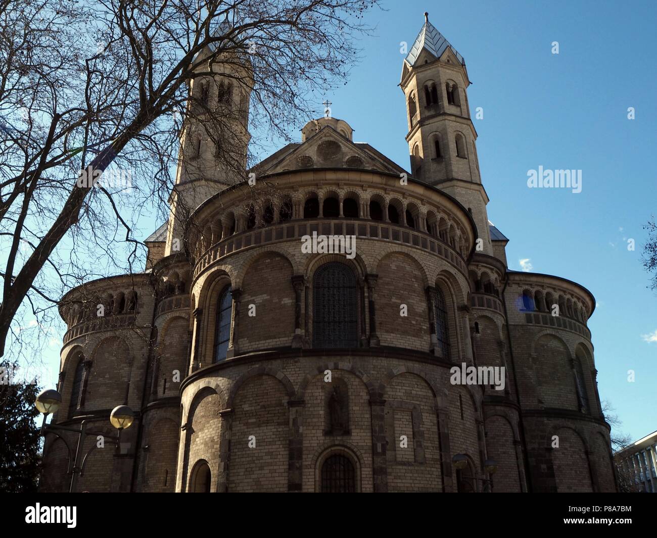 St. Aposteln church in Cologne with the blue sky in the background Stock Photo