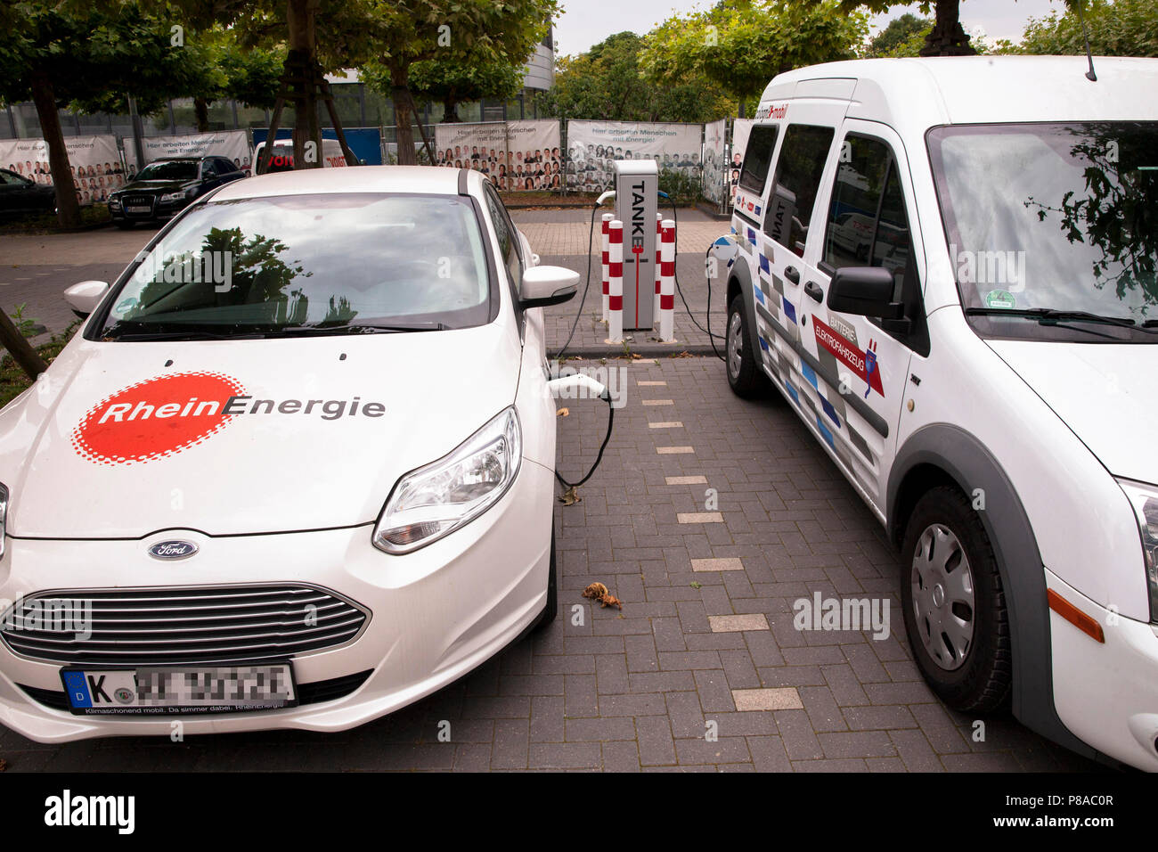 company cars of the energy provider RheinEnergie at a charging station for  electric cars, Cologne, Germany Dienstwagen des Energieversorgers RheinEne  Stock Photo - Alamy