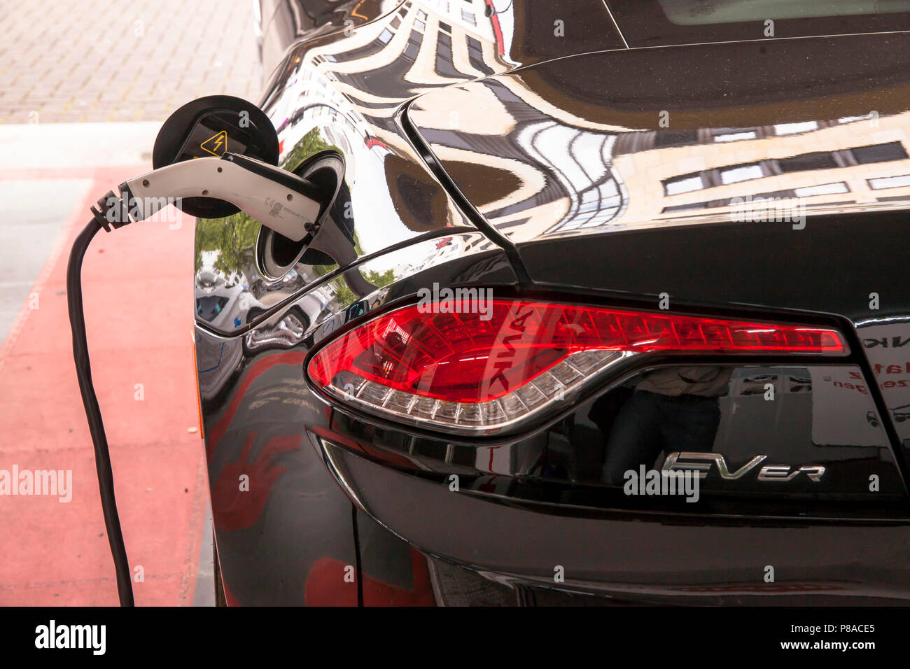 electric car Fisker Karma at a charging station at the street Lungengasse, Cologne, Germany  Fisker Karma an einer E-Tankstelle/Ladestation in der Lun Stock Photo