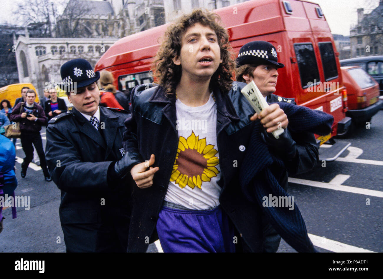 Earth First Activist Being Arrested at Rainforest Protest outside Houses of Parliament, London, England, UK, GB. Stock Photo