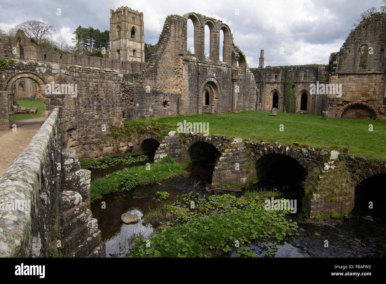 The River Skell flowing under Fountains Abbey, Ripon, North Yorkshire ...
