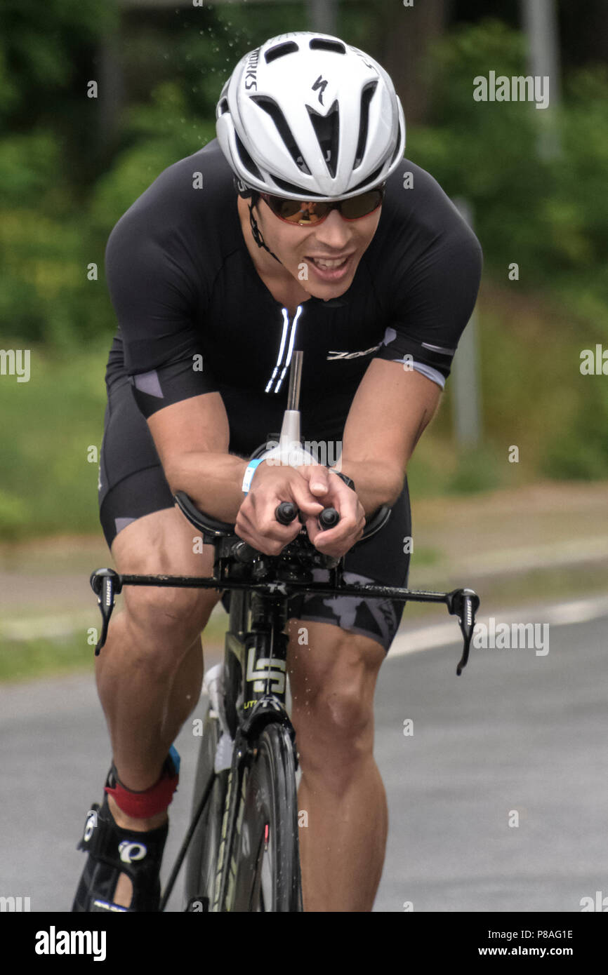Chris Hagues competiting in the bike segment in the 2018 Hague Endurance Festival Olympic Triathlon Stock Photo