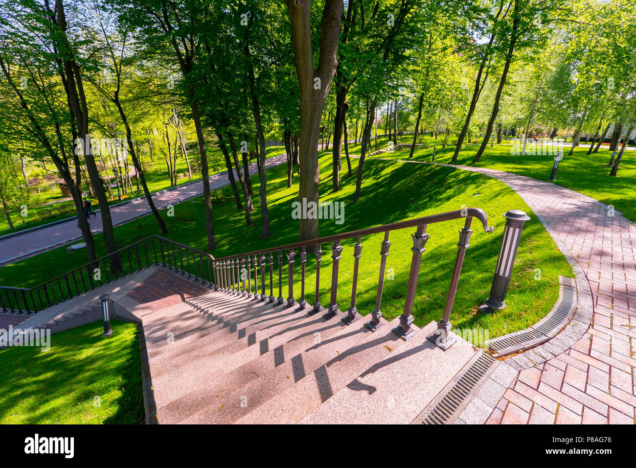 Go downstairs with flashlights in a green summer park on a lively day . For your design Stock Photo
