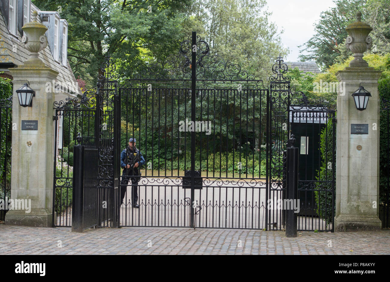 An armed police officer at us ambassadors residence winfield house hi