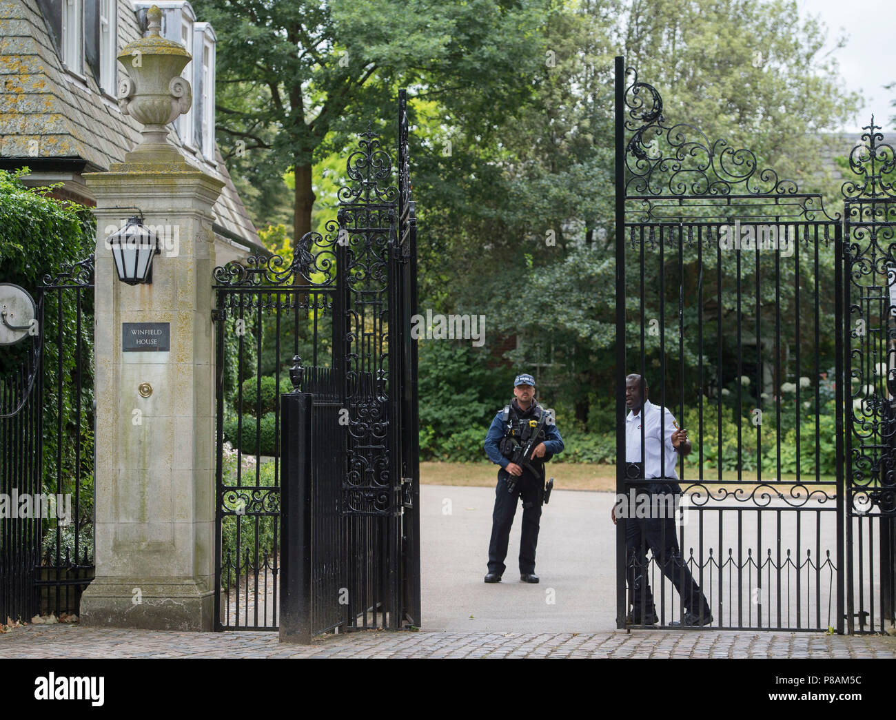An armed police officer at us ambassadors residence winfield house hi