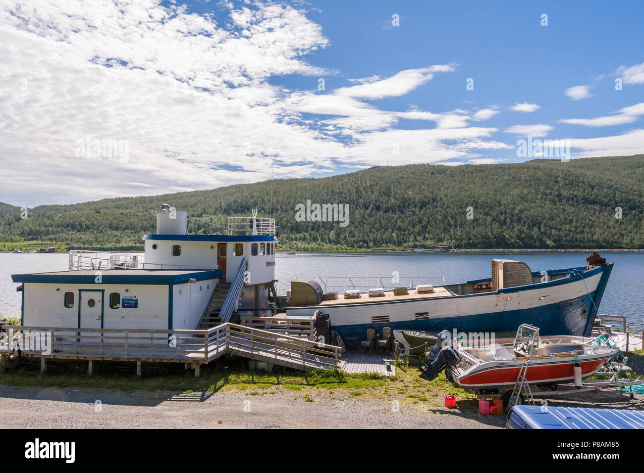 Komagfjord, Selungen, Karens rorbuer. Old seal ship that is used as hotel. Stock Photo