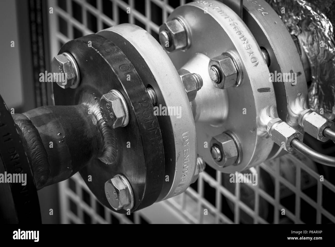 Welded pipe fittings on a oil heating system Stock Photo