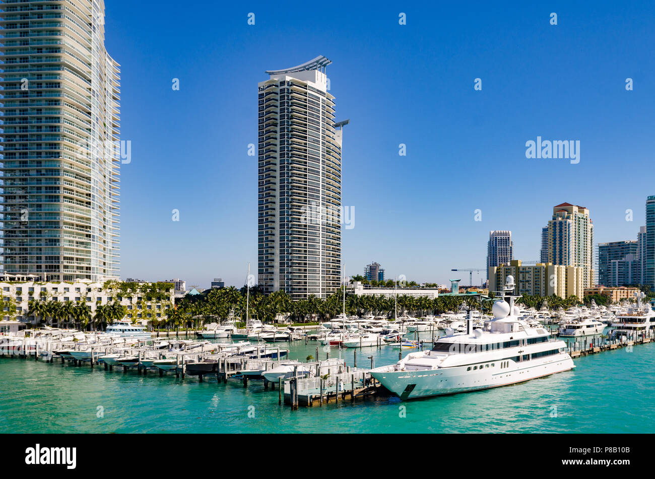 Miami Beach with luxury apartments and boats in waterway Stock Photo