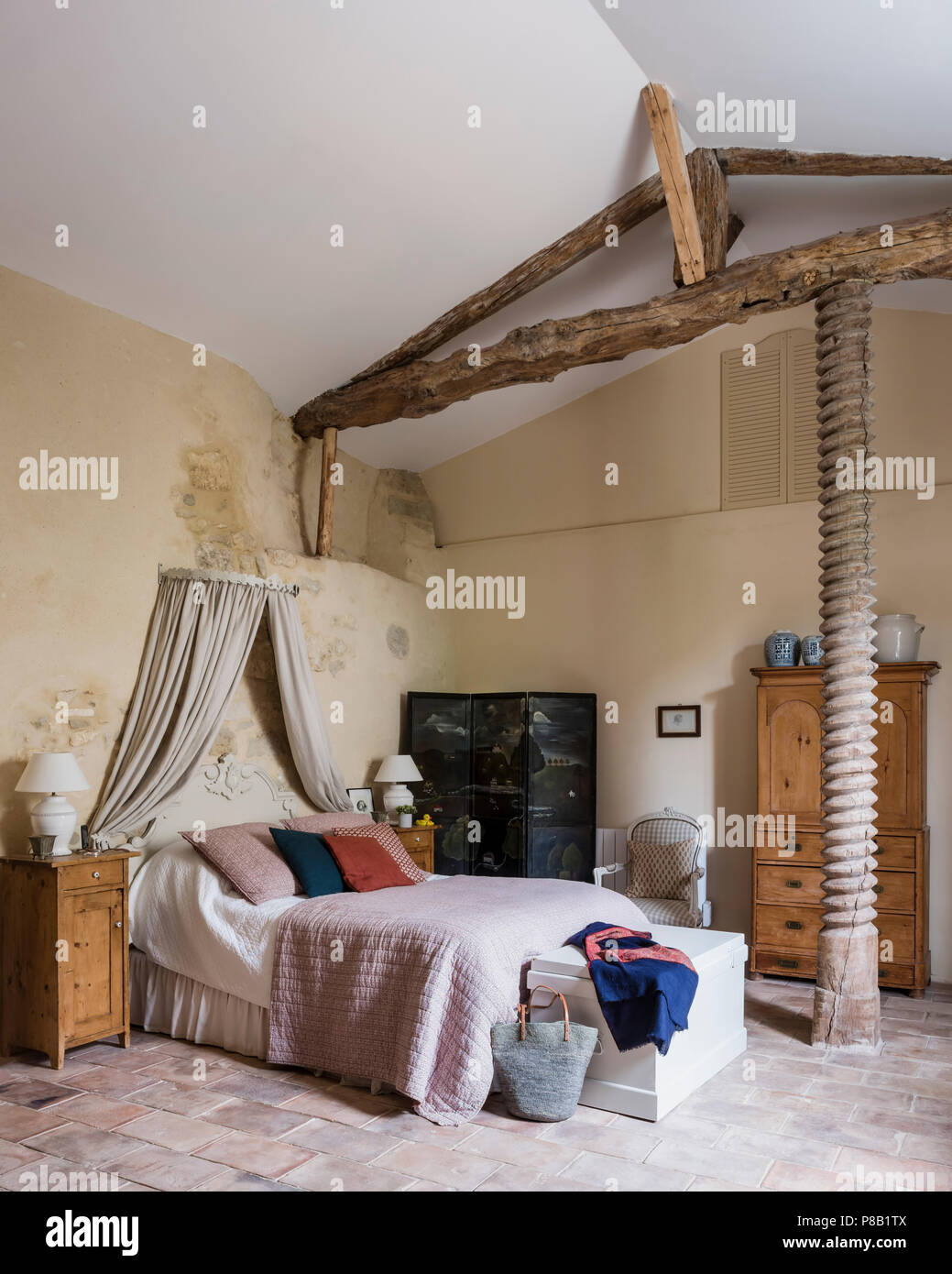 Old Oak Oil Press In Master Bedroom With Wooden Furniture