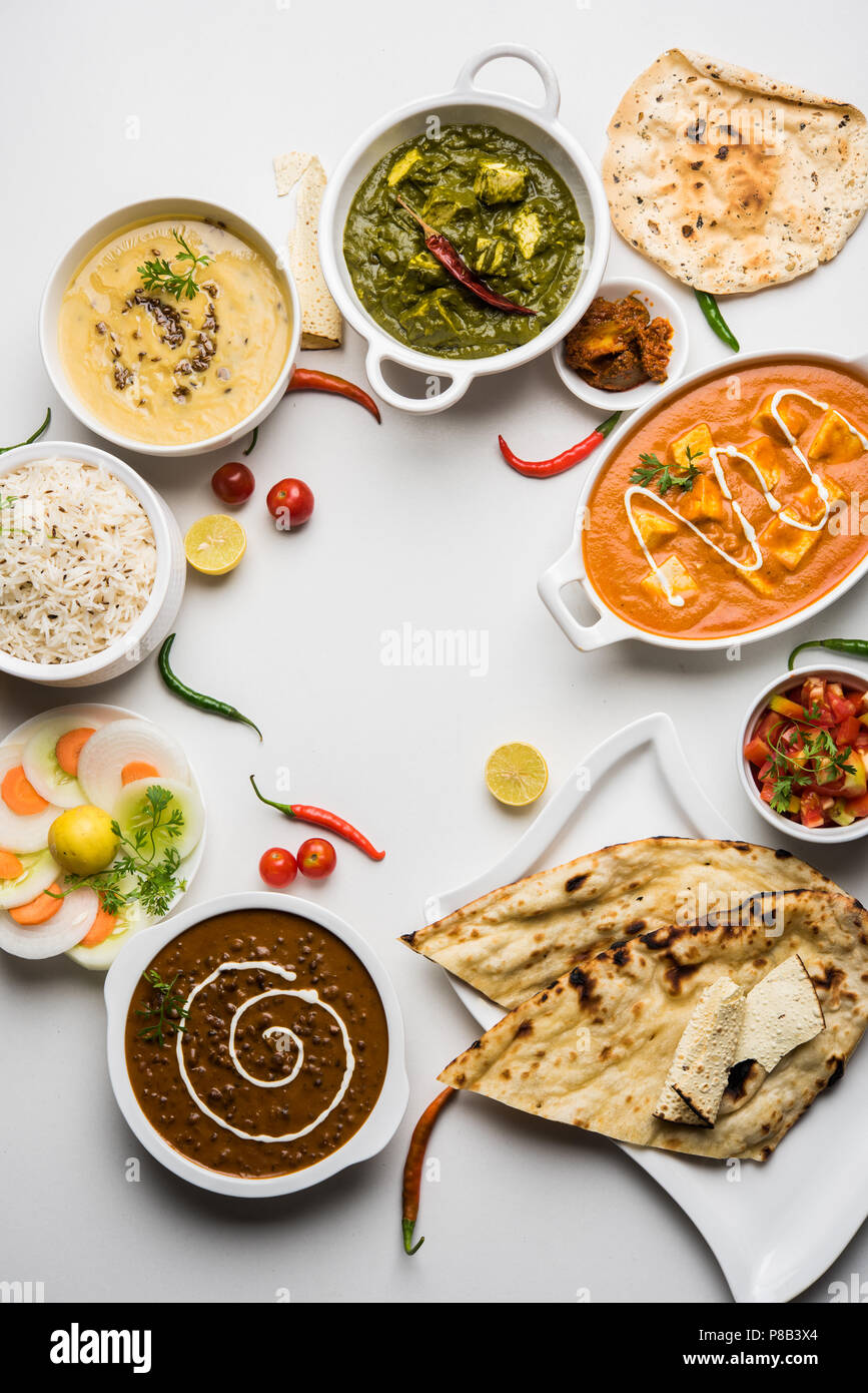 Assorted indian food for lunch or dinner, rice, lentils, paneer, dal