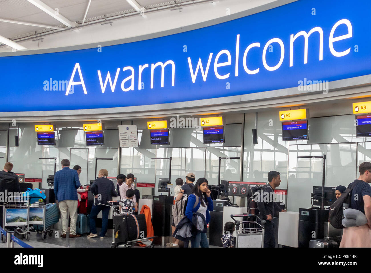 Passengers waiting at the British Airways check in desks at Heathrow