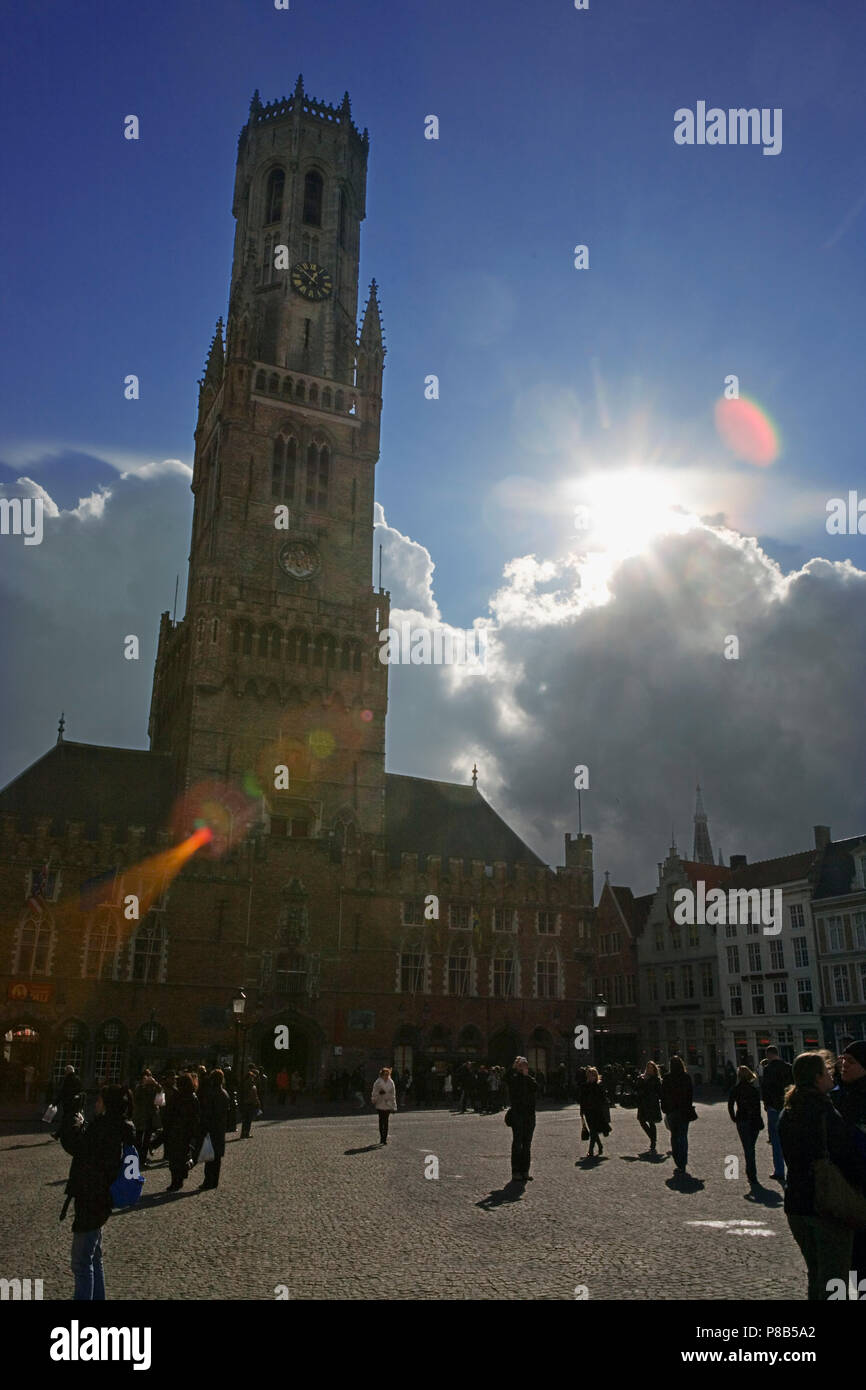 The soaring gothic Belfort, or Belfry Tower of the Hallen dominates the Markt, Brugge, Belgium Stock Photo