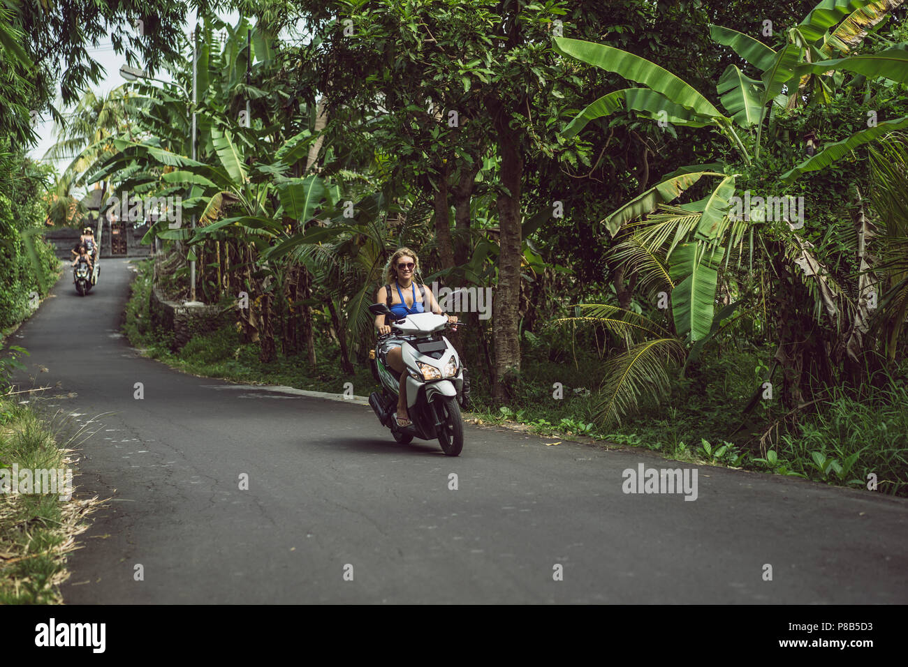 Girls with motorbikes hi-res stock photography and images - Alamy