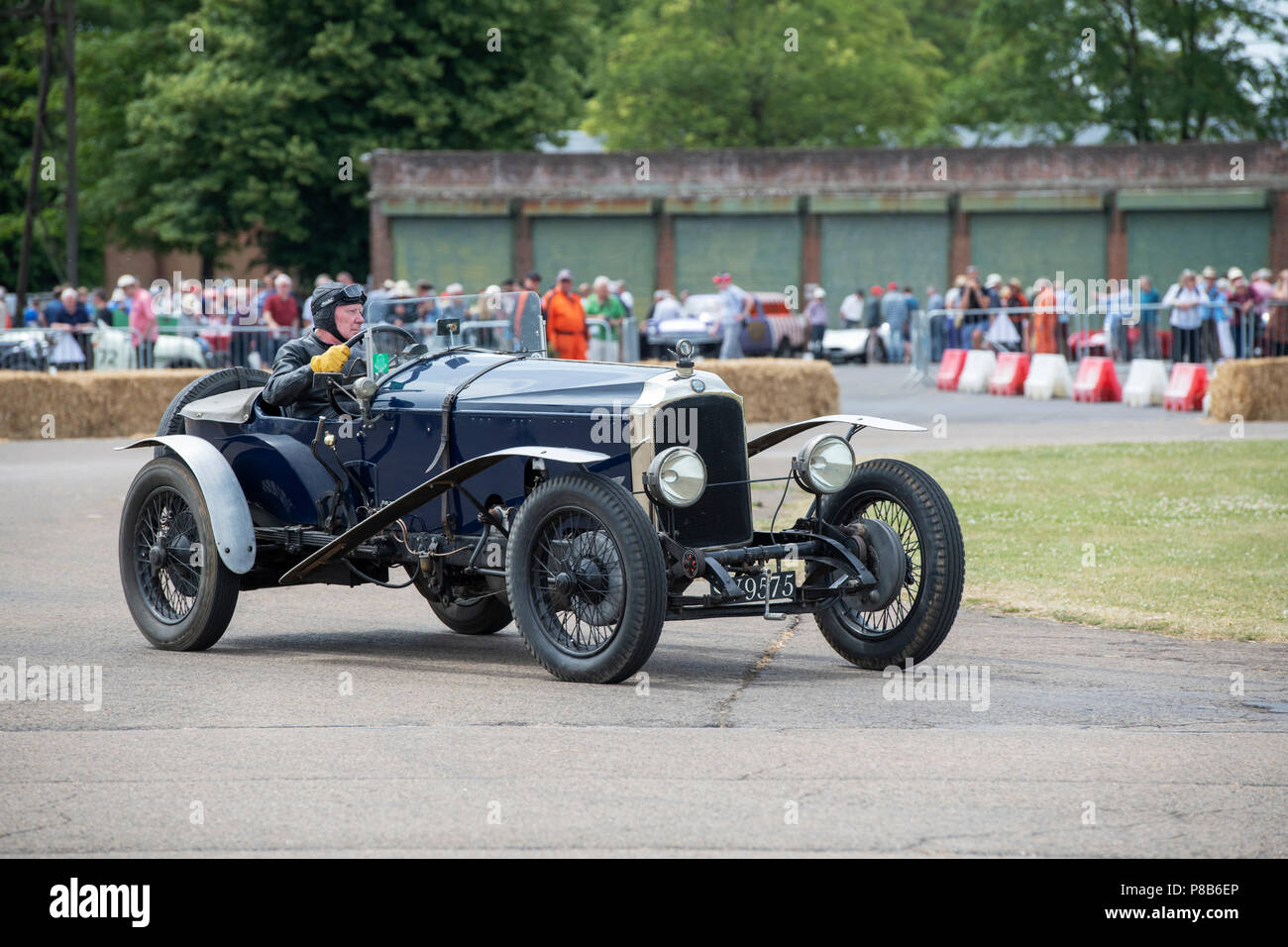 1926 Vintage Vauxhall racing car driven around a track at the Bicester