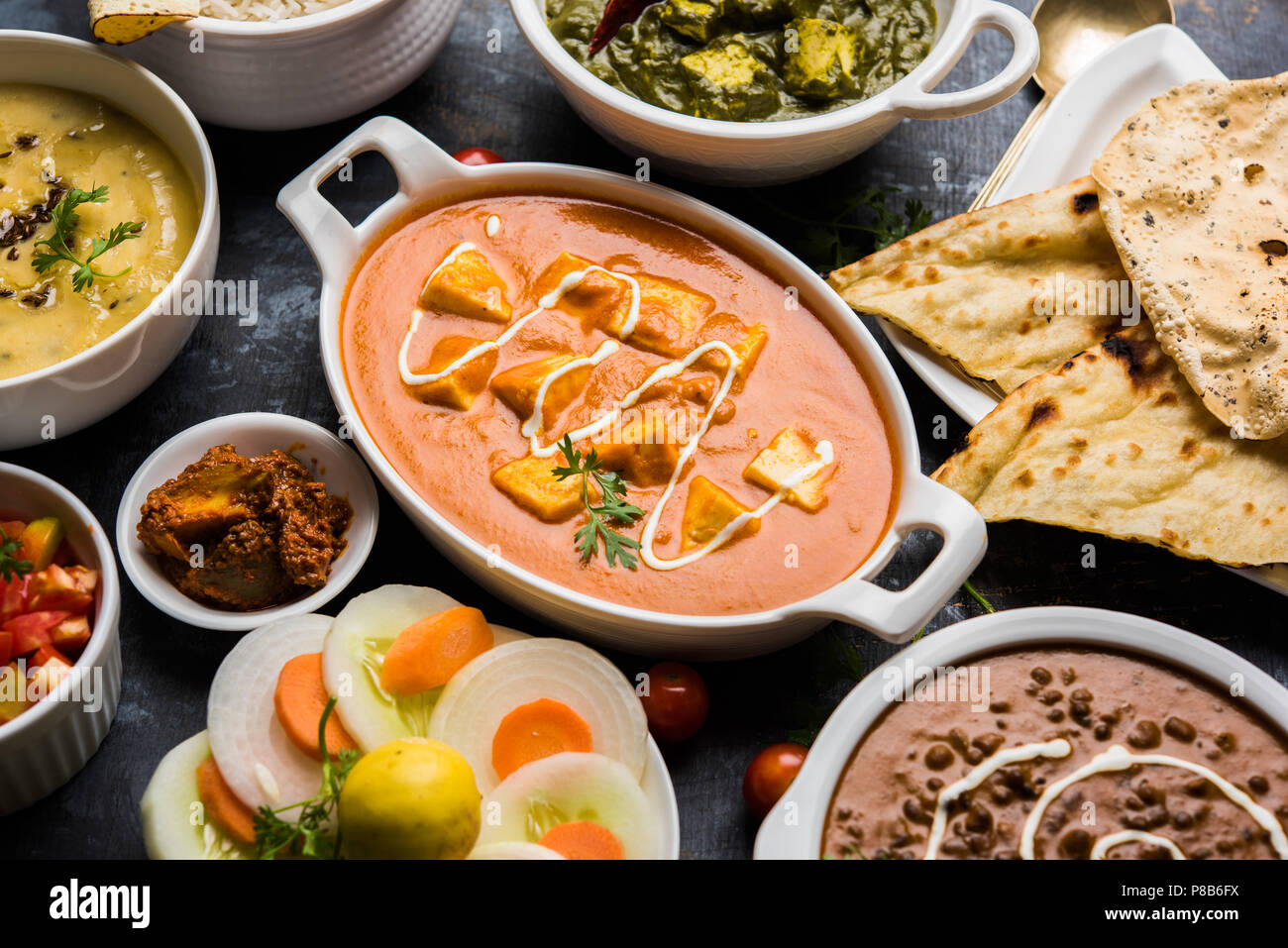 Assorted indian food for lunch or dinner, rice, lentils, paneer, dal