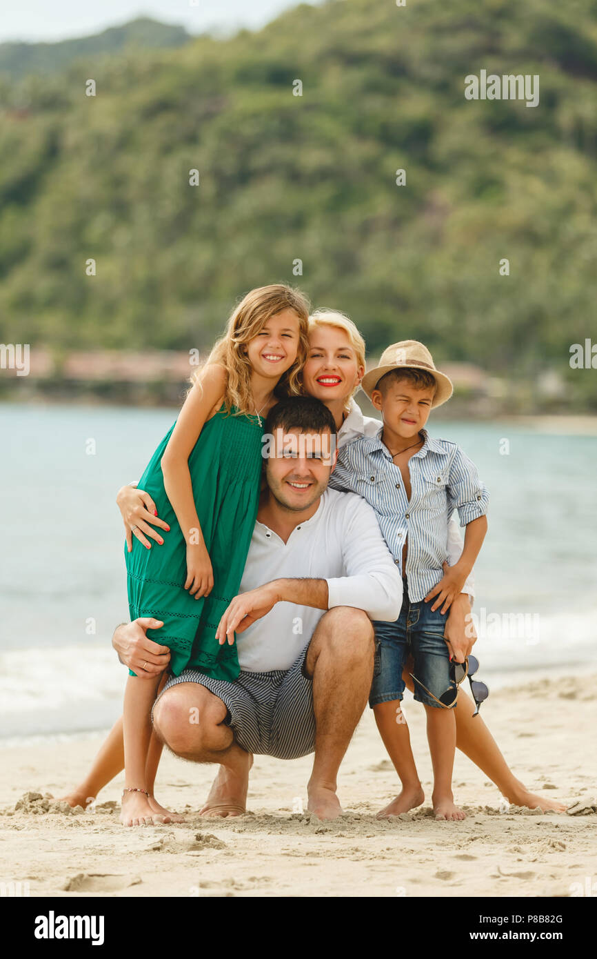 Happy family on vacation hi-res stock photography and images - Alamy