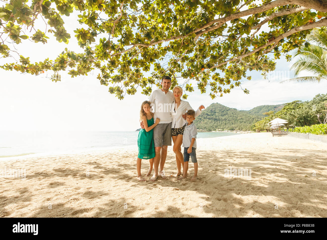 Happy family on vacation hi-res stock photography and images - Alamy