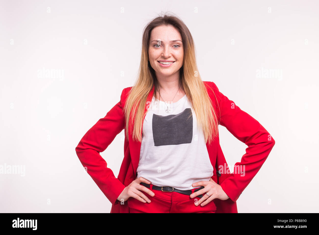 Gorgeous woman in red suit hi-res stock photography and images - Alamy
