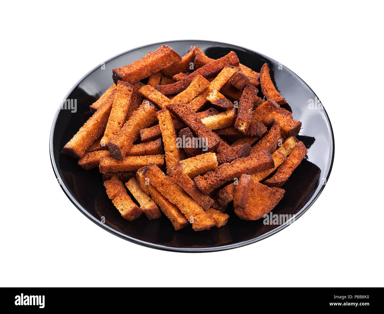 Fried bread croutons isolated on white background. Crispy rye bread sticks Stock Photo