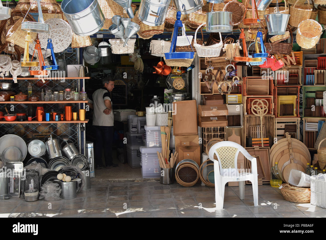 https://c8.alamy.com/comp/P8BA6F/athens-greece-july-4-2018-man-in-traditional-housewares-store-in-downtown-athens-P8BA6F.jpg