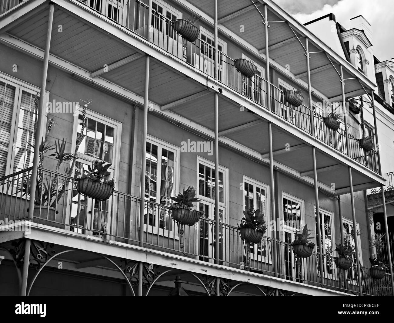 New Orleans, LA USA - May 9, 2018  -  French Quarter Balcony with Plants 8 B&W Stock Photo