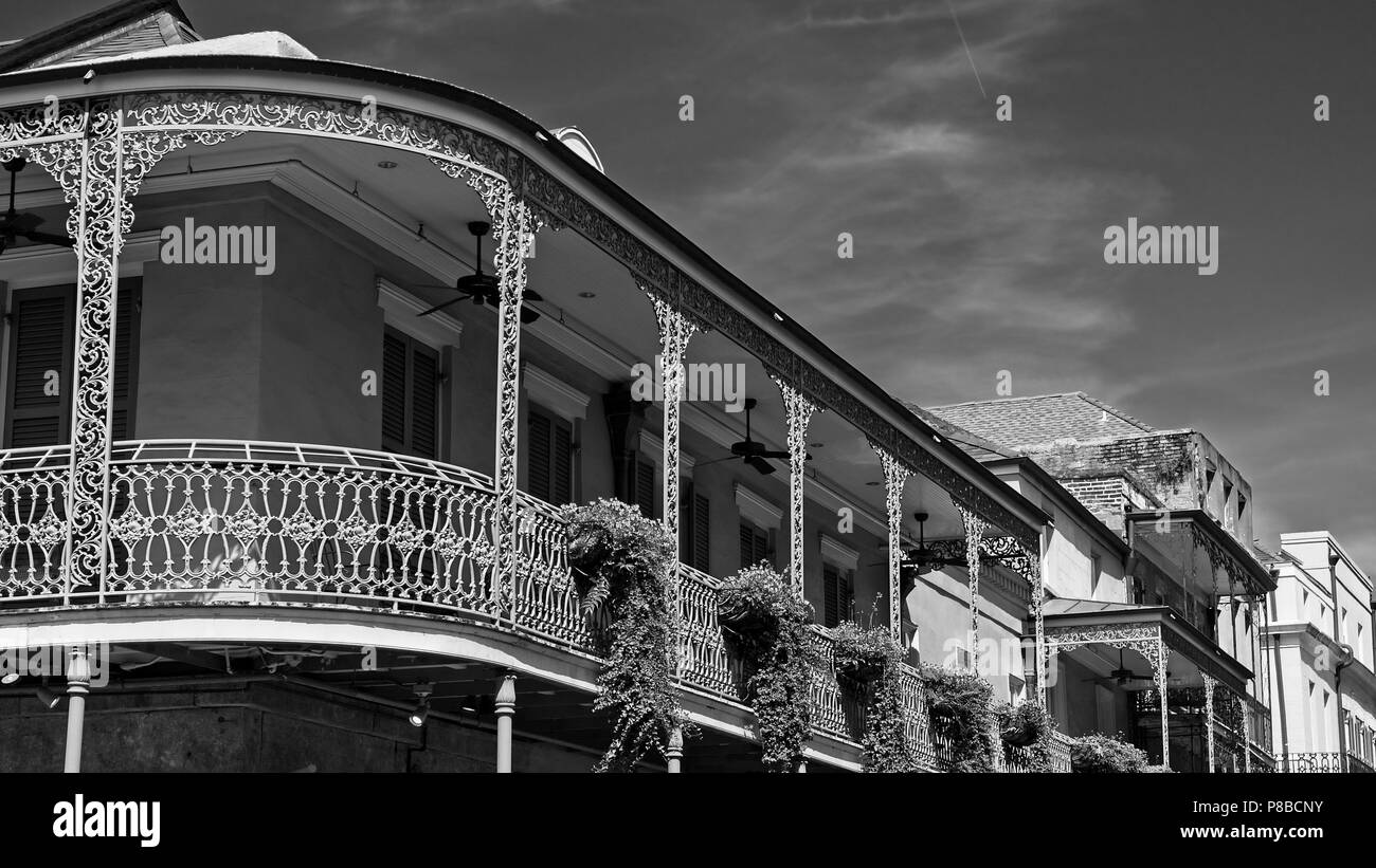 New Orleans, LA USA - May 9, 2018  -  Old French Quarter Buildings with Balcony #4 B&W Stock Photo