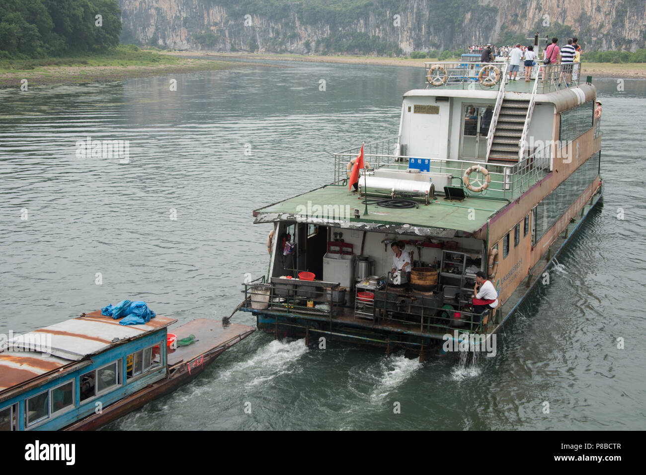 River boats on the Li River in Guangxi Zhuang china, on the journey from Guilin to Yangshuo. Stock Photo