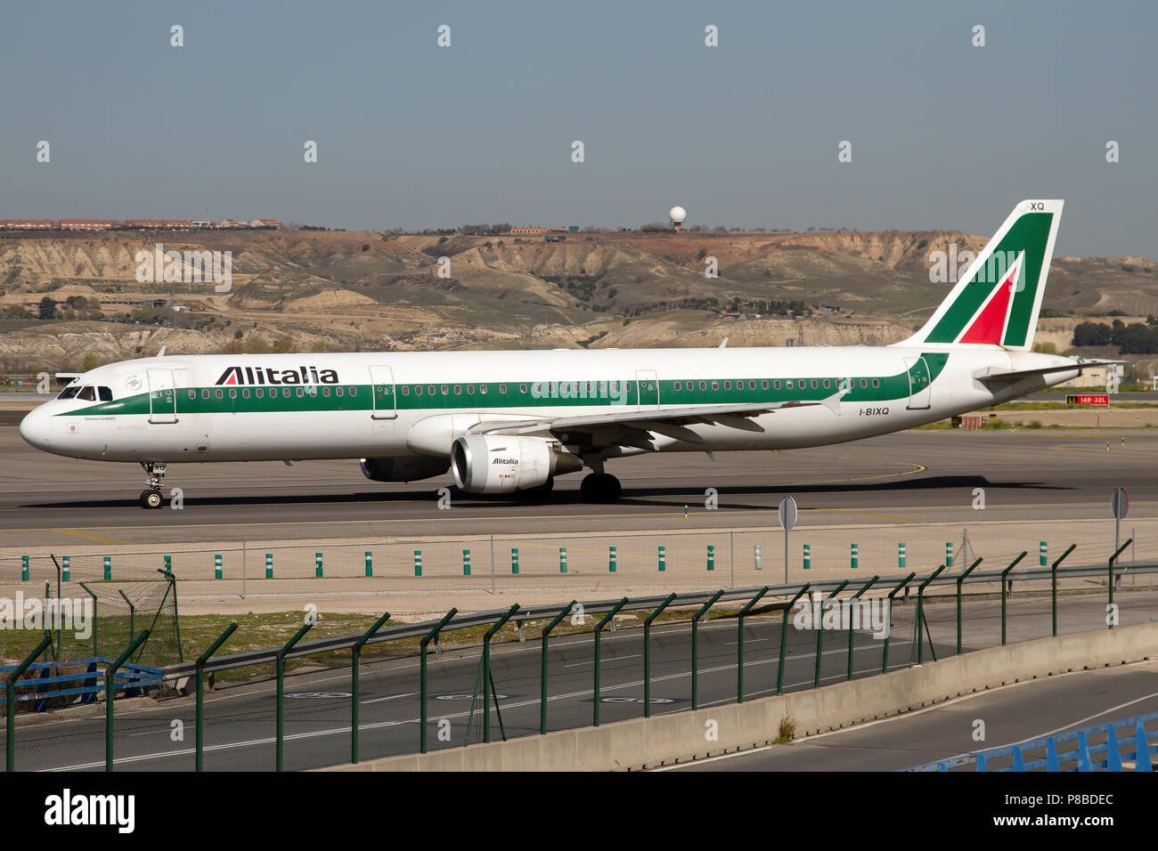 An Alitalia Airbus A321 on the taxiway at Madrid Barajas airport Stock