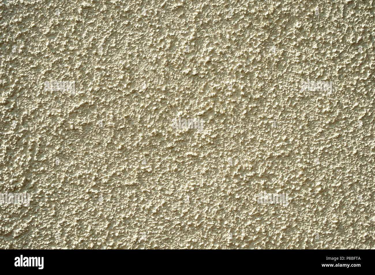 Painted rough cast wall render texture full frame background Stock Photo