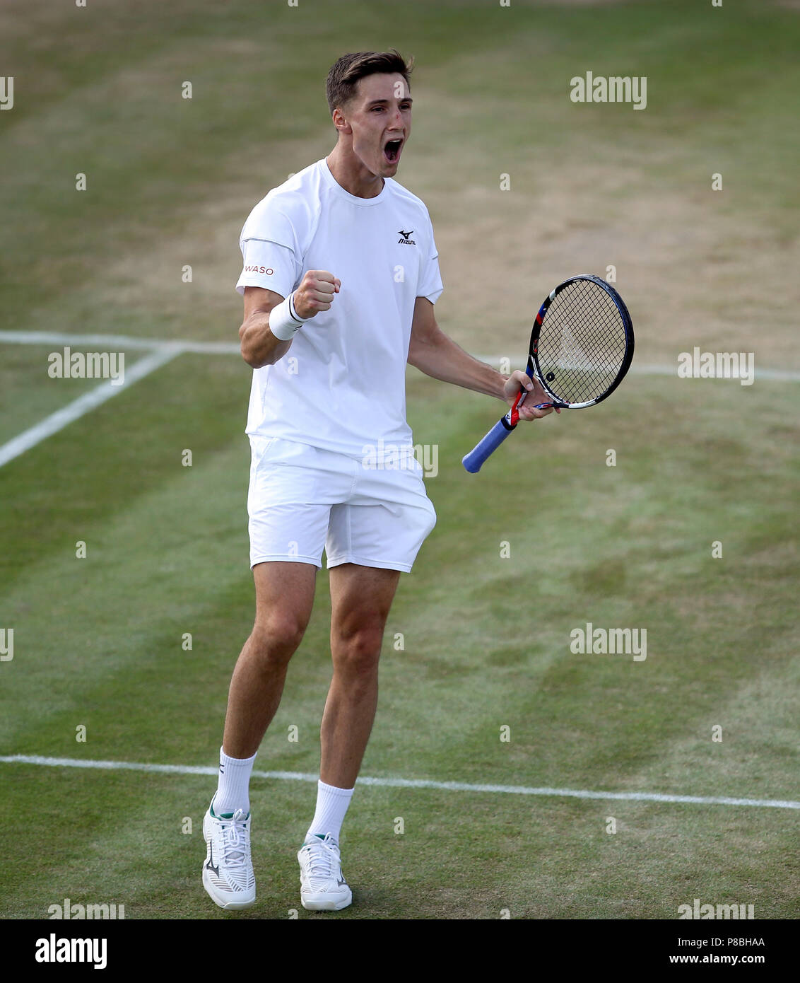 Joe Salisbury celebrates winning his doubles match on day eight of