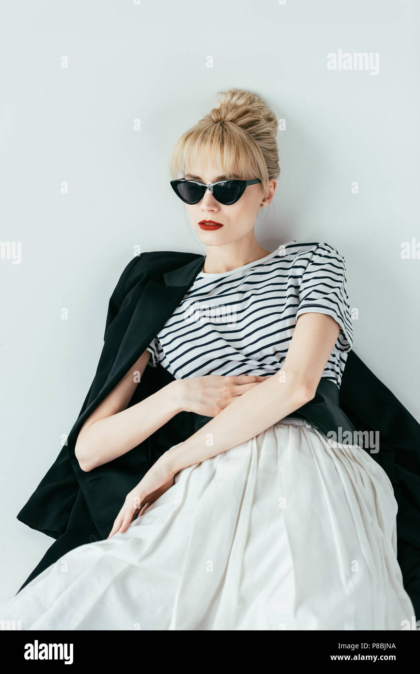 Attractive young woman wearing black jacket and sunglasses Stock Photo ...