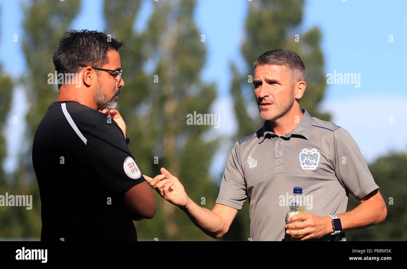 Huddersfield Town manager David Wagner (left) and Bury manager Ryan Lowe prior to the pre-season friendly match at the Energy Check Stadium, Bury. PRESS ASSOCIATION Photo. Picture date: Tuesday July 10, 2018. See PA story SOCCER Bury. Photo credit should read: Simon Cooper/PA Wire. RESTRICTIONS: No use with unauthorised audio, video, data, fixture lists, club/league logos or 'live' services. Online in-match use limited to 75 images, no video emulation. No use in betting, games or single club/league/player publications. Stock Photo