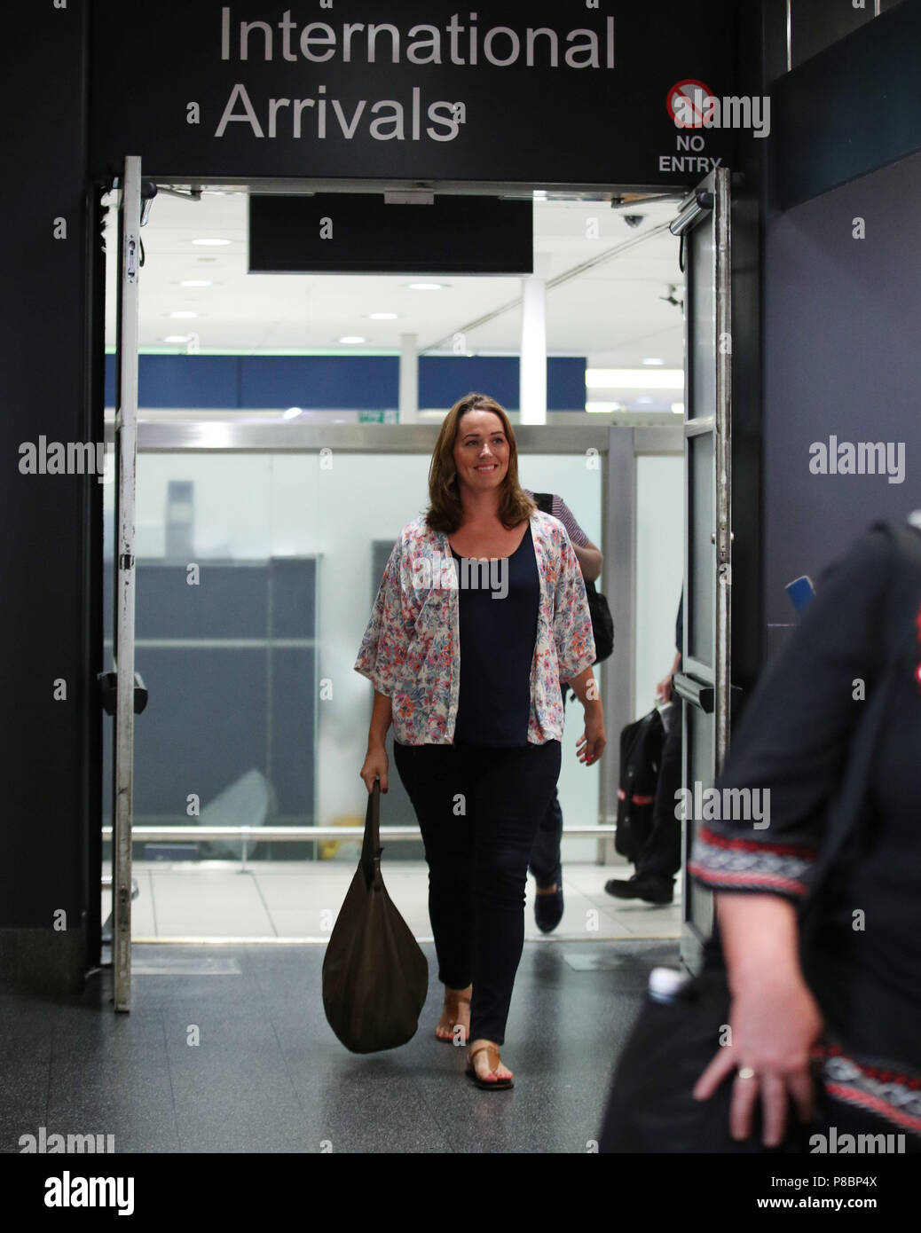 Hannah Deacon, the mother of six-year-old Alfie Dingley, arrives at London City Airport as she arrives in the UK with a supply of medical cannabis to treat her epileptic son following a long term licence for cannabis oil being granted to the family by the Home Office. Stock Photo
