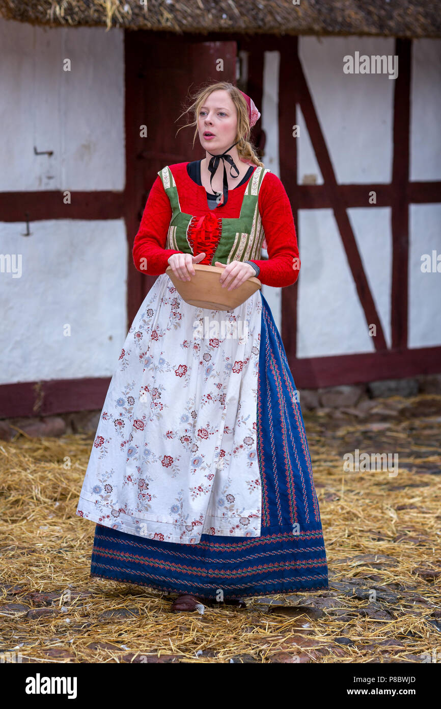 Woman dressed in traditional clothes from the 17 to 18 century, The Open Air Museum, Frilandsmuseet, Lyngby, Denmark Stock Photo