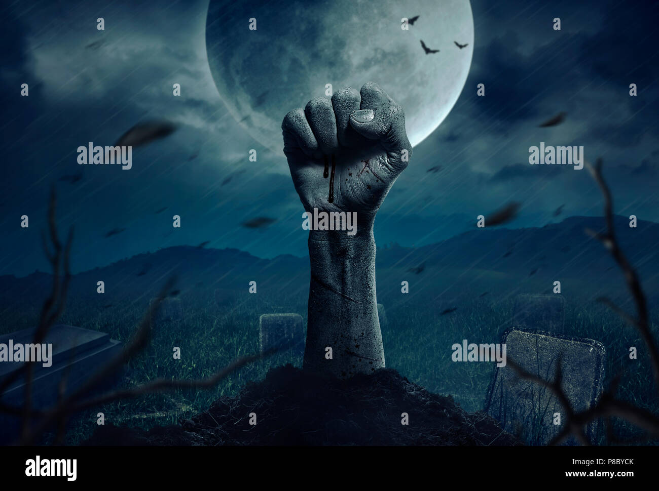 Zombie hands rising in dark Halloween night Stock Photo Alamy