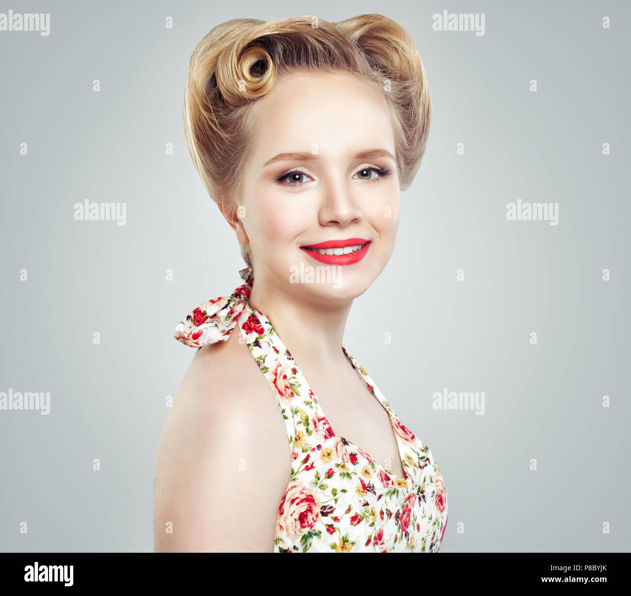Young Smiling Blonde Woman On Gray Background Fashion Portrait