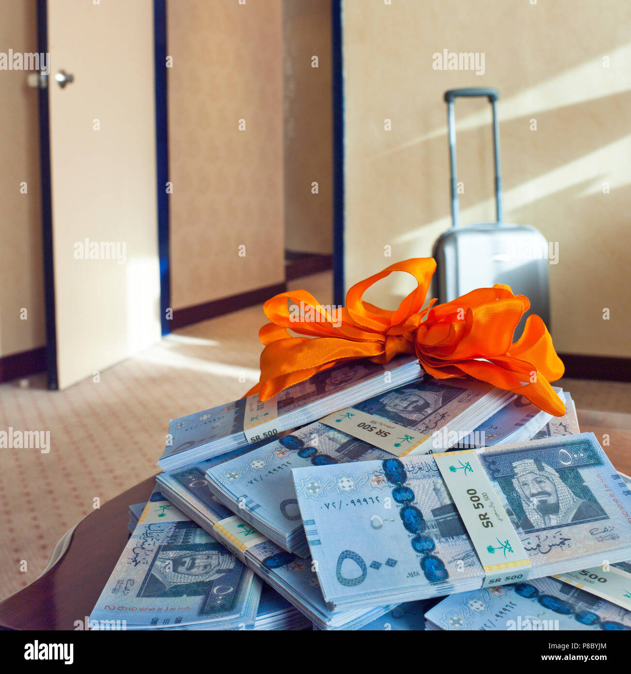Cash prize, Stacks of Saudi Riyal banknotes on the side table at home Stock  Photo - Alamy