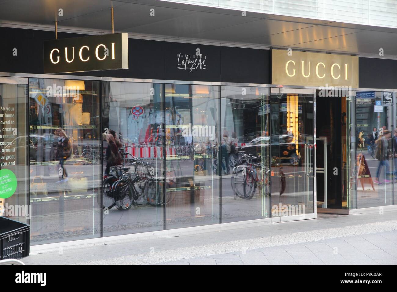BERLIN, GERMANY - AUGUST 26, 2014: Gucci store windows in Berlin. Luxury brand Gucci exists since 1921 and was valued at 12.1 billion USD in 2013 Photo Alamy