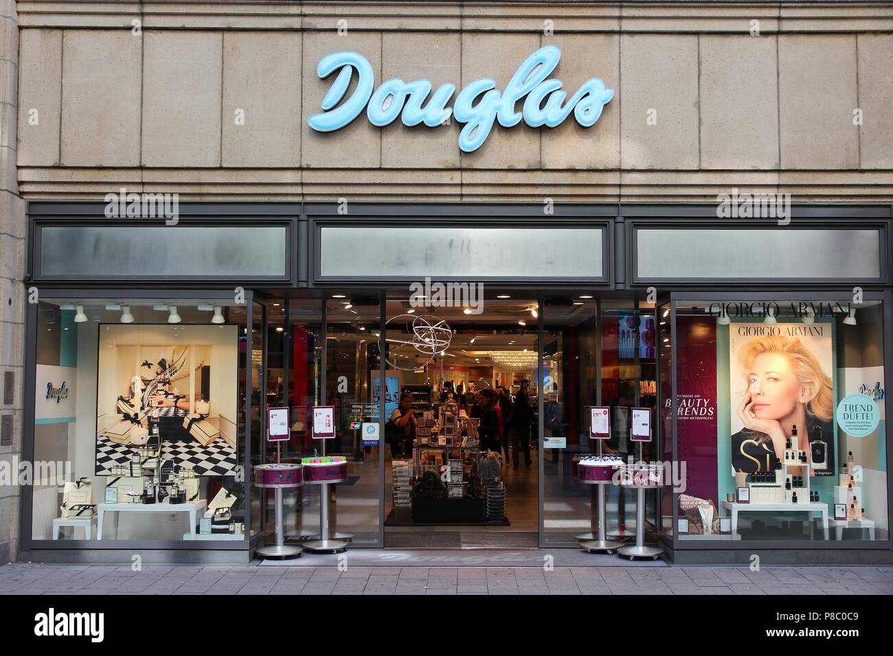 HAMBURG, GERMANY - AUGUST 28, 2014: People visit Douglas perfumery in  Spitallerstrasse, Hamburg. Douglas Holding was founded in 1949 and has  2,100 sto Stock Photo - Alamy