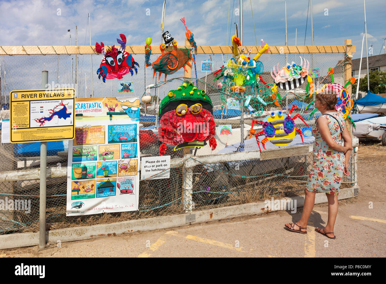 Display of artistic crabs and notice boards at Mersea Island. Stock Photo