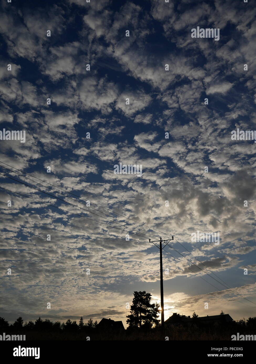 Panorama of the power line against the background of the morning cloudy ...