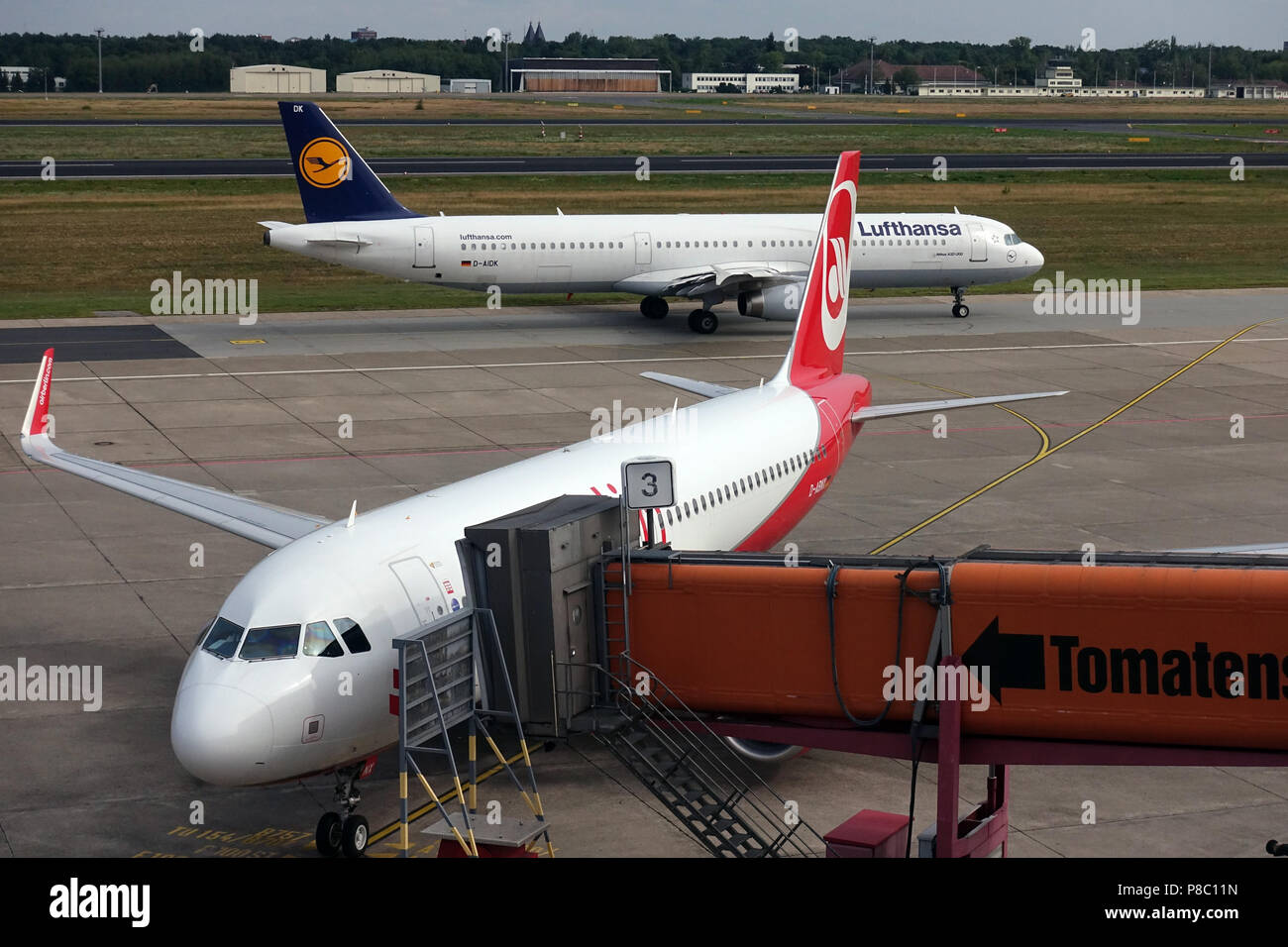 Berlin, Germany, Airbus A321 of Lufthansa and Airbus A320 of Air Berlin at Berlin-Tegel Airport Stock Photo