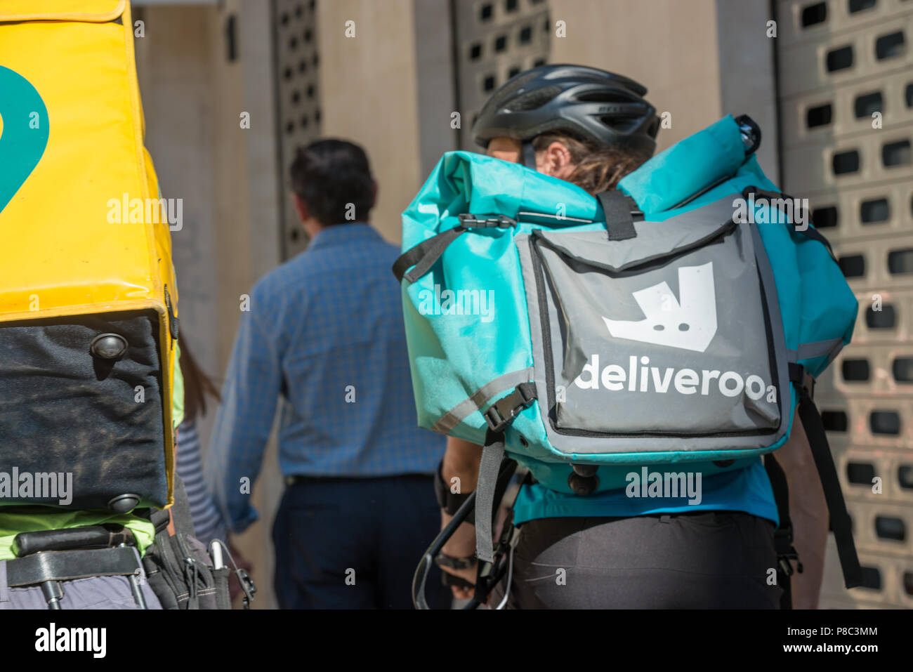 Detail of the backpack of a delivery boy on a bicycle from the company  deliveroo in Málaga, Andalusia, Spain Stock Photo - Alamy