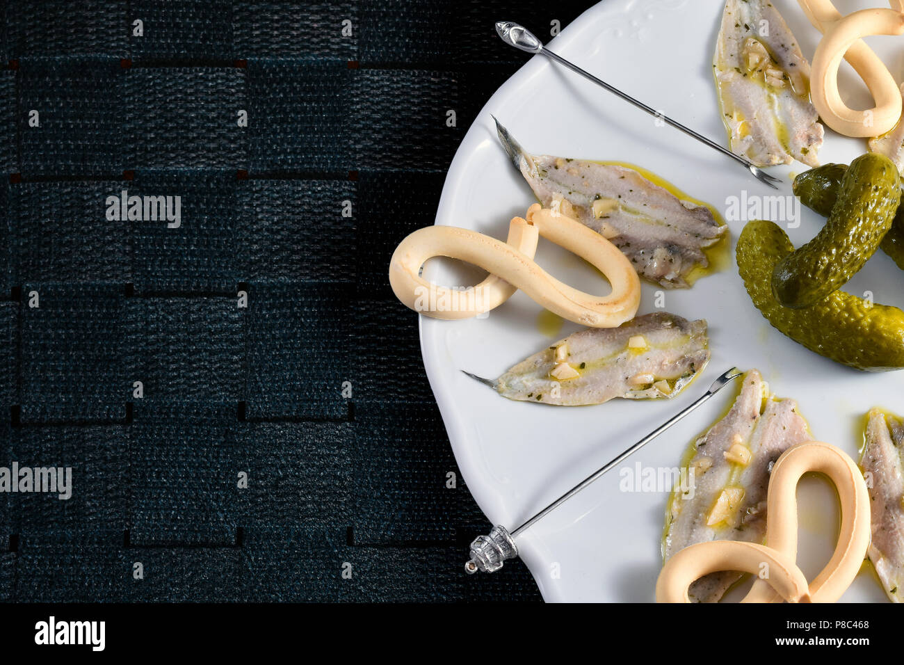 Spanish typical dish recipe with anchovies in vinegar to share Stock