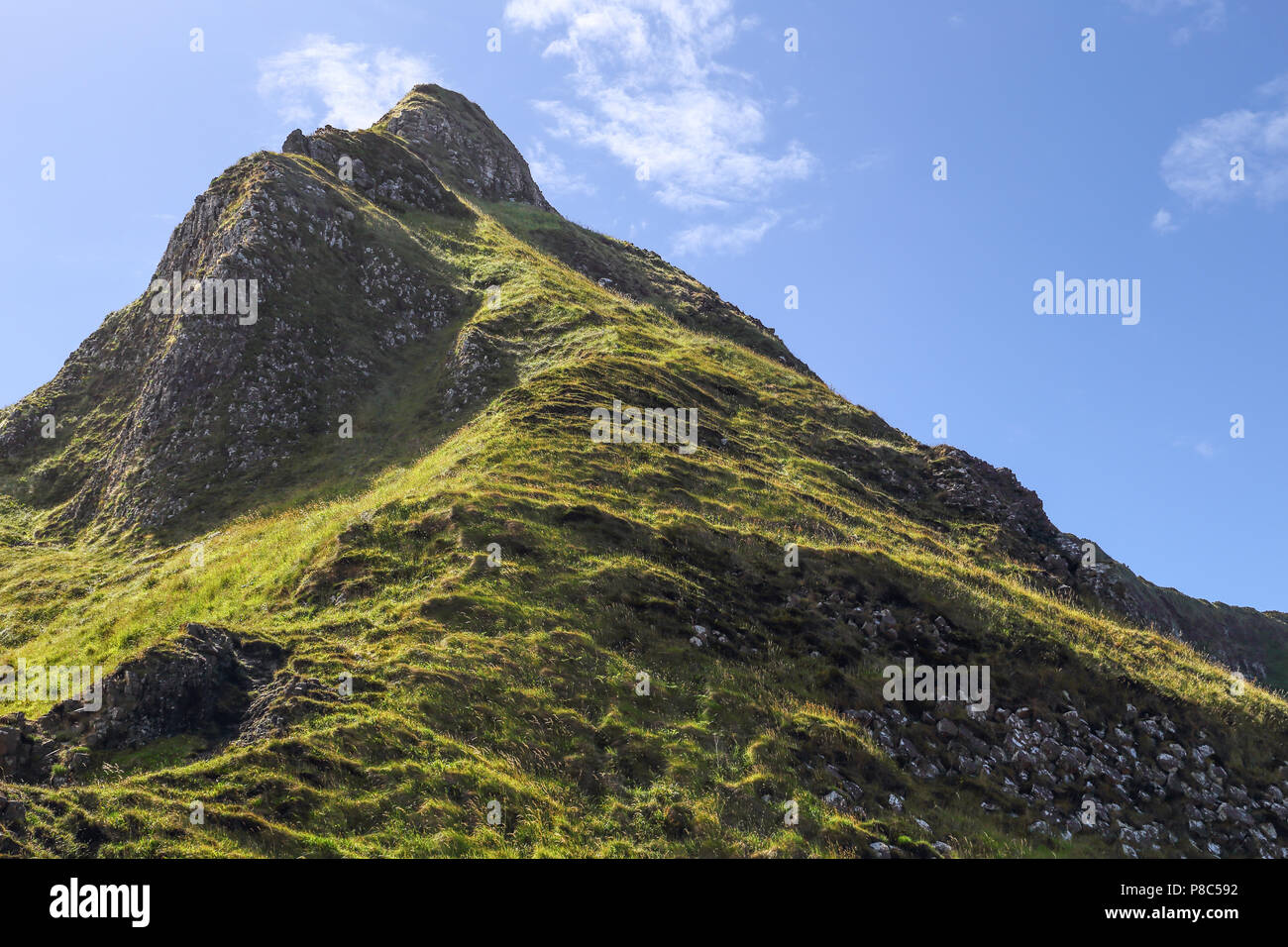 The Giant's Causeway is an area of about 40,000 interlocking basalt columns, the result of an ancient volcanic fissure eruption. It is located in Coun Stock Photo