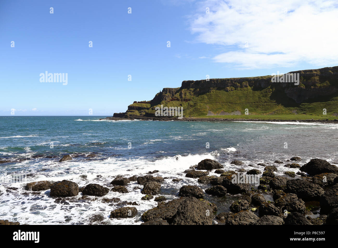 The Giant's Causeway is an area of about 40,000 interlocking basalt columns, the result of an ancient volcanic fissure eruption. It is located in Coun Stock Photo