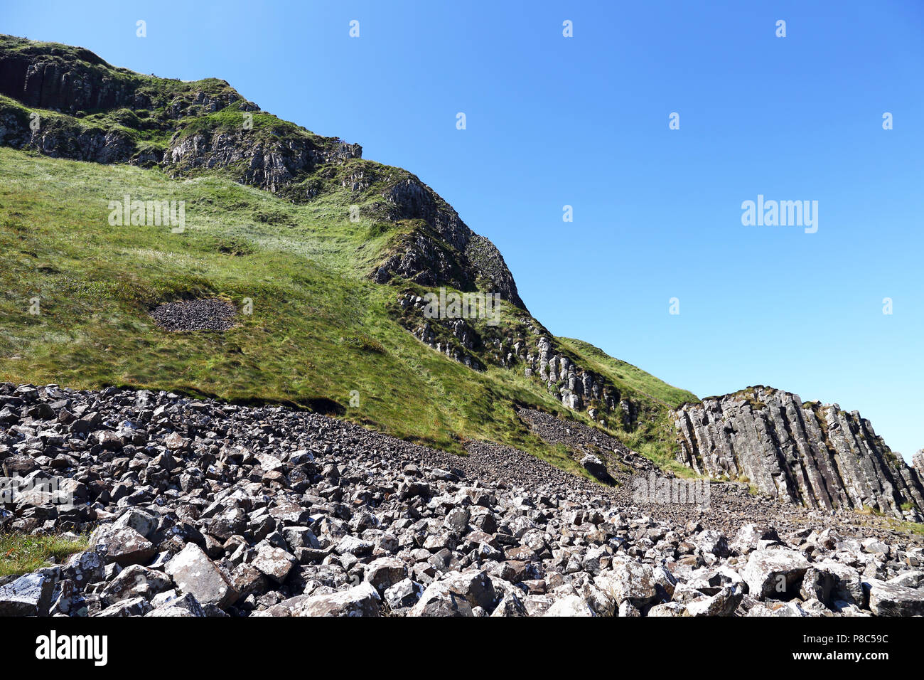 The Giant's Causeway is an area of about 40,000 interlocking basalt columns, the result of an ancient volcanic fissure eruption. It is located in Coun Stock Photo