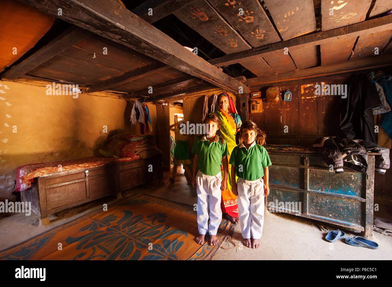 Mother with sons at Kundal Village, Nandhour Valley, Uttarakhand, India Stock Photo